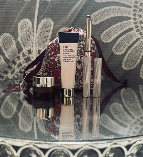 Estée Lauder Futurist 4pc Set: Aqua Brilliance Face Primer, Cream, Lipstick, Bag