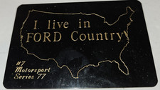 Black, "I Live in Country" Small Metal Dashboard Sign NOS
