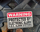 Small sticker Warning Protected By fake Bs Electronic Alarm Systems