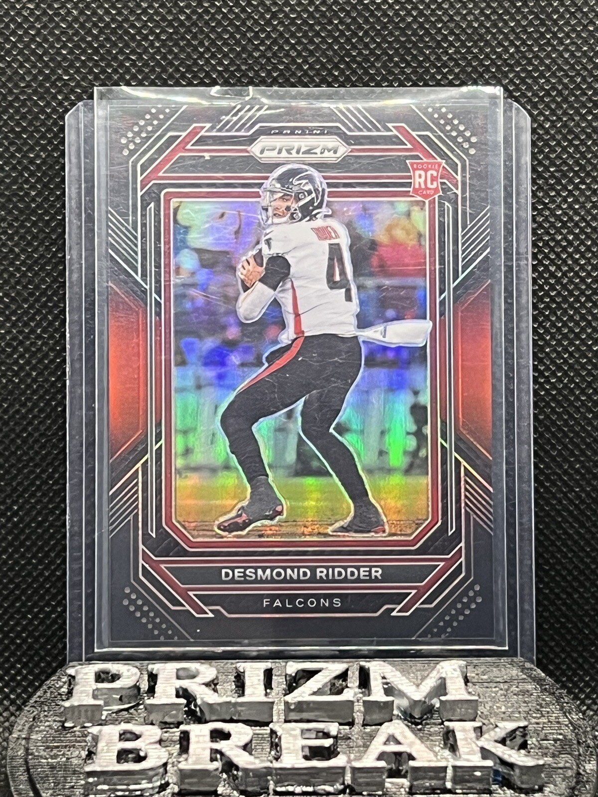 2022 Panini Chronicles Prizm Black Desmond Ridder RC Rookie Red #’d/99 Falcons