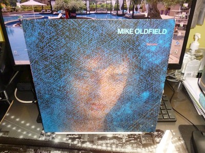 MIKE OLDFIELD. '' DISCOVERY '' LP UK  1984. VIRGIN LABEL. ORIG. NM.