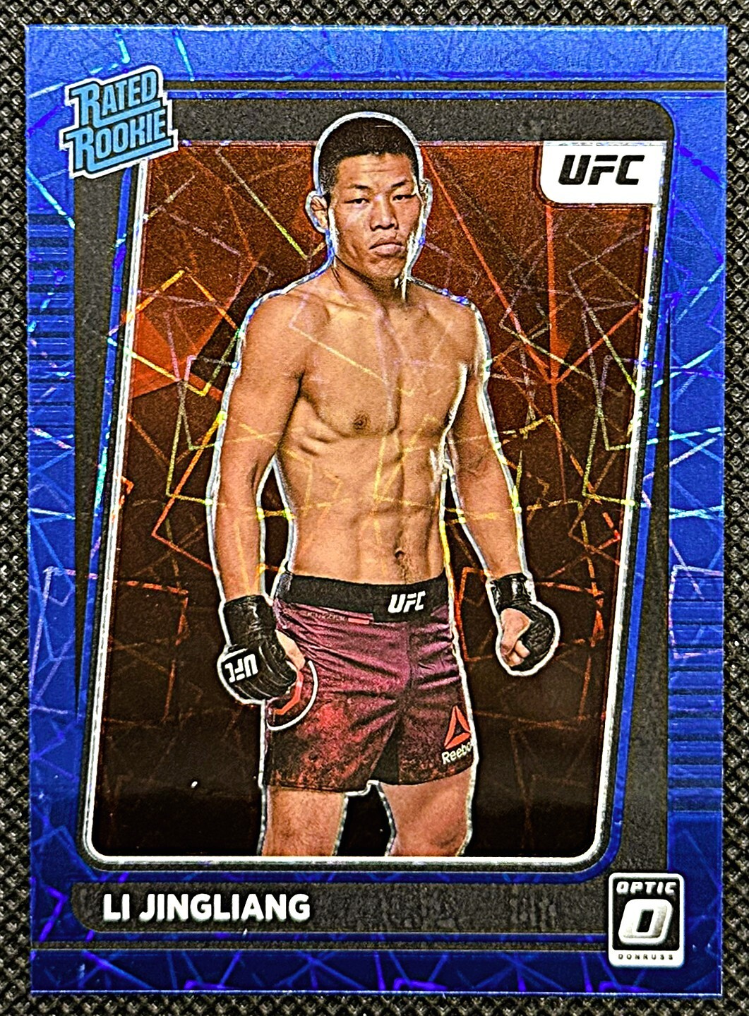 2022 Panini Donruss Optic UFC Blue Velocity Prizm Rated Rookie #113 Li Jingliang