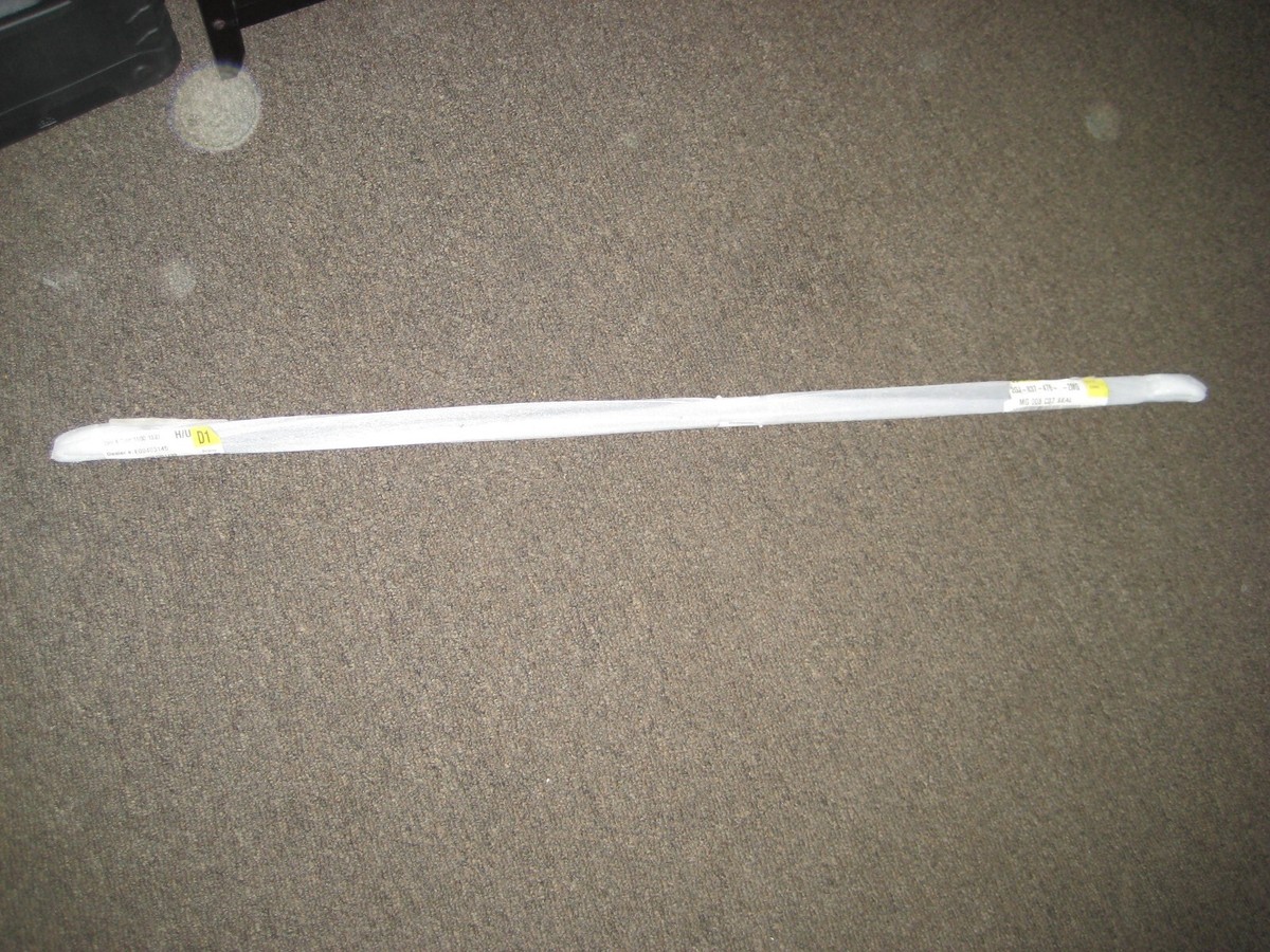 VOLKSWAGEN TAOS FRONT RIGHT SIDE DOOR WINDOW BELT MOLDING OEM 22 