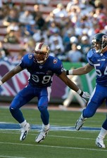 Julian Peterson NFC in action v the AFC at the NFL Pro Bowl Game o- 2004 Photo 6