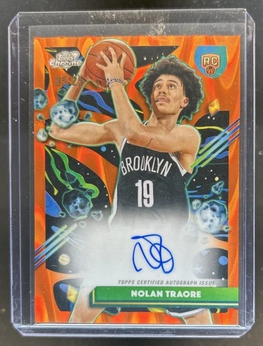 2025-26 Topps Cosmic Chrome Nolan Traore Auto RC Orange Galactic Refractor #/25