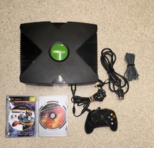 Original Xbox with original controller, 2 games. Works perfectly