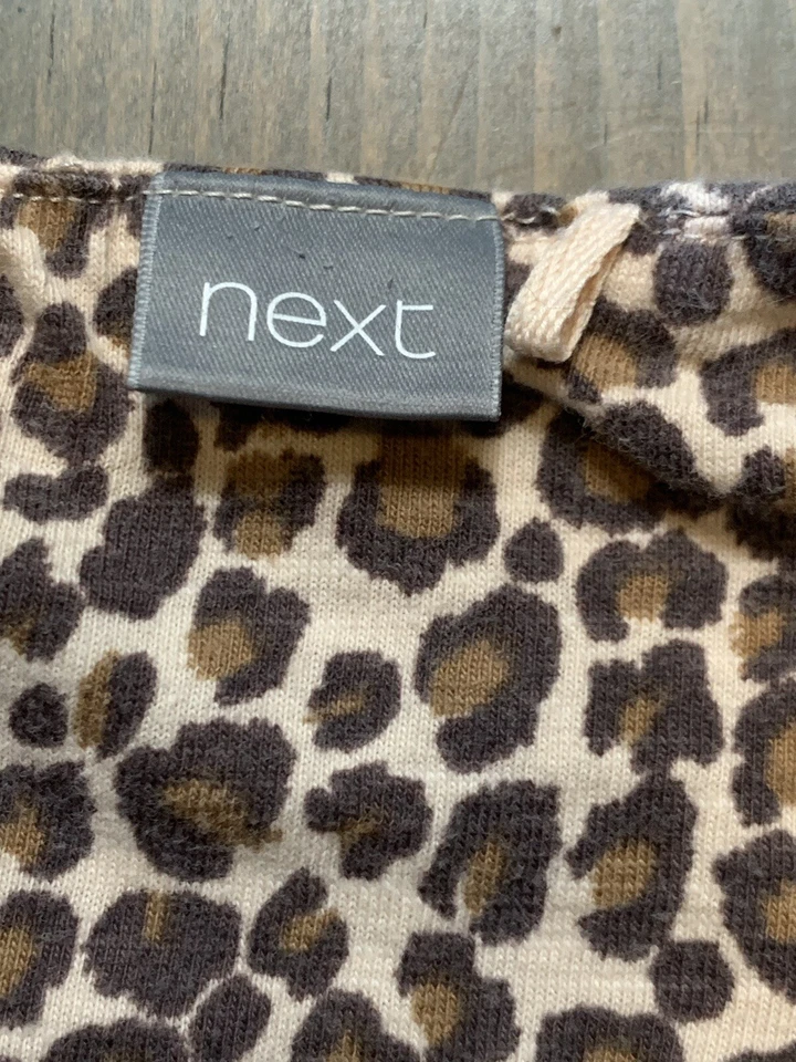 SIGUIENTE Pantalones de jersey para niñas pequeñas sin mangas marrón estampado de leopardo Talla: 2-3 años Foto 4 de 4