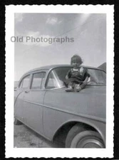 BABY ALONE ATOP CAR HOOD 4 DOOR SEDAN OLD/VINTAGE PHOTO- N453