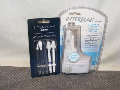 CONAIR INTERPLAK COMPACT WATER FLOSSING SYS WJX01 W/WATER FLOSSER TIPS**NEW