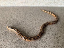 Vintage wooden toy movable snake on joints