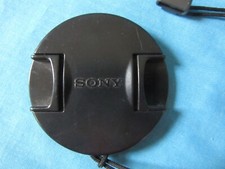 Sony Camcorder Lens Cap about 55mm Diameter -- Clip On Type - Used