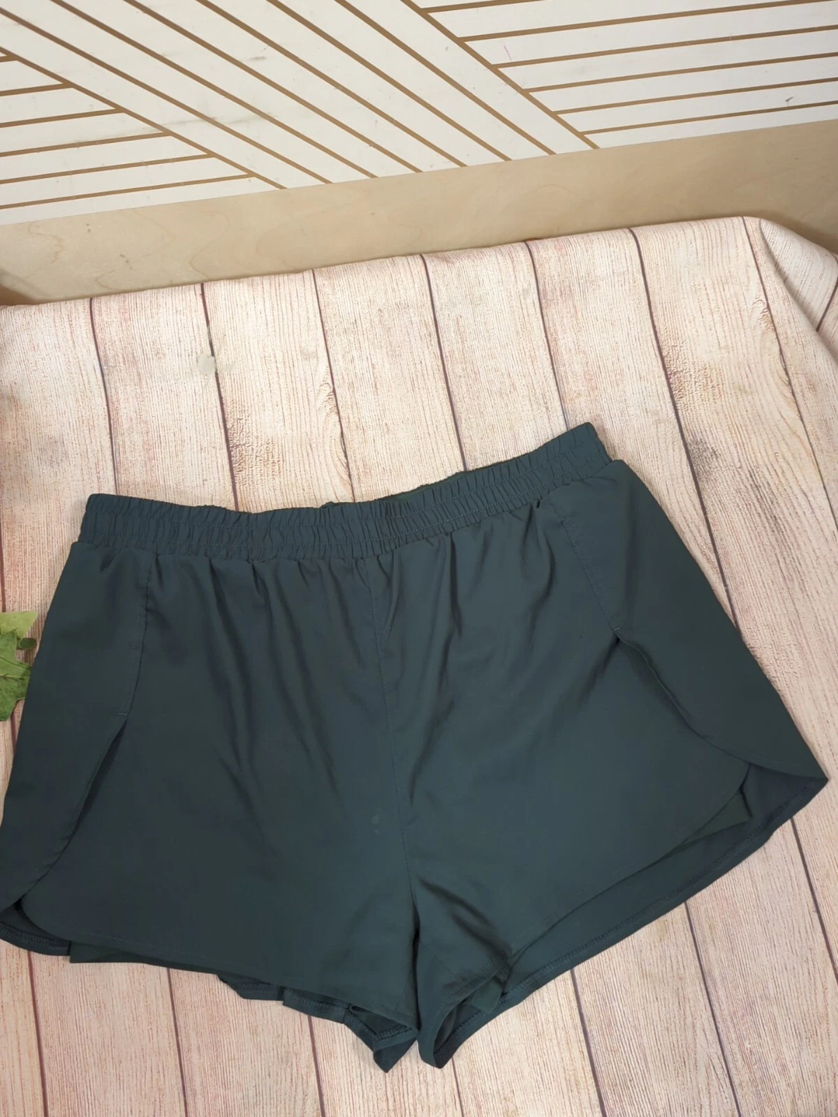 girlfriend-collective moss trail athletic pockets read shorts