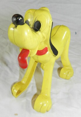 Vintage Walt Disney W.D.P. Hard Plastic Wind-Up Pluto- spinning tail working