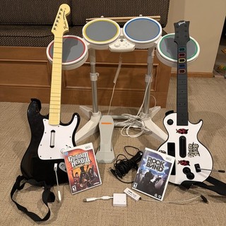 Wii Rock Band Bundle with Drums 2 Guitars Microphone and 2 Games