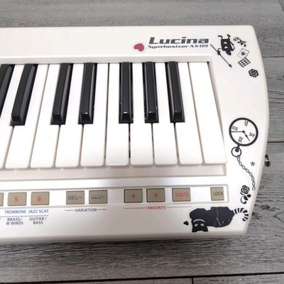 Roland AX-09 Lucina Shoulder Keyboard Synthesizer 37-Key Keytar w