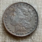 1897 morgan silver dollar in good / fair condition - see pics