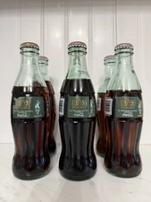 1996 8 oz. Unopened Coca-Cola Classic Bottle re the Olympic Torch Relay