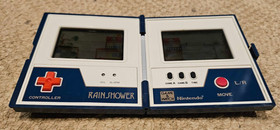 NINTENDO RAIN SHOWER Game and Watch vintage electronic handheld LCD game 1983