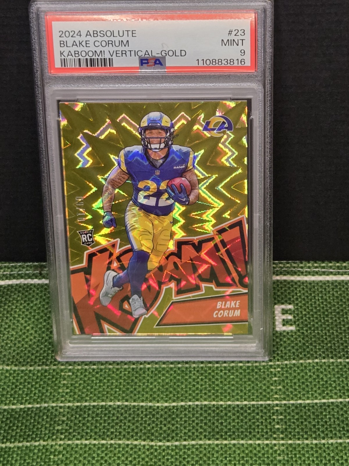 2024 Panini Absolute - Kaboom! Vertical Blake Corum #23 Gold /10 (RC)