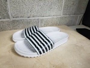 black and white striped slides