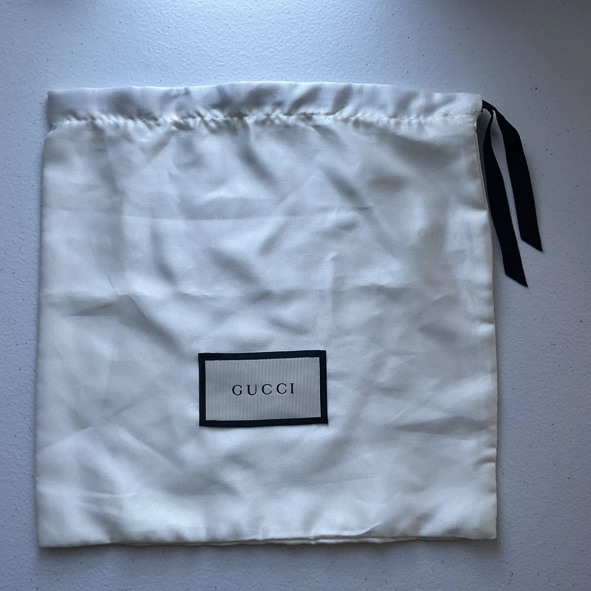 Gucci belt dust best sale bag