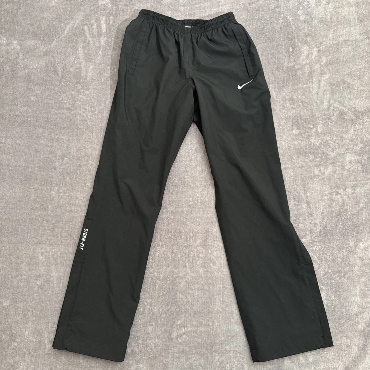 Preços baixos em Calça Nike STORM FIT em calças de Golfe