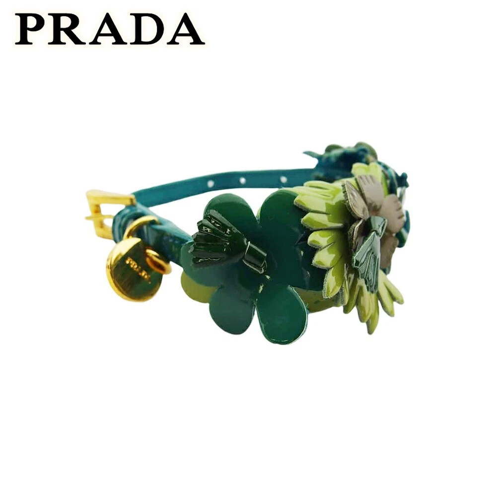 Y0710 Prada Bracciale Donna Logo Charm Motivo Fiore Verde Cachi Accessori Ne