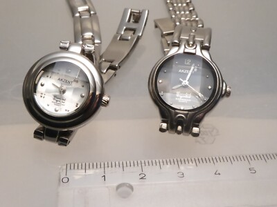 2 x Damen Quartzuhr  AKZENT Crystal Glas Facetten silberfarben Metall 78,7 g