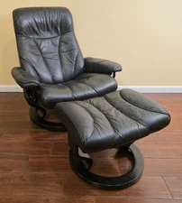 Ekornes Stressless Large "Tiara" Black Leather Swivel Recliner and Ottoman