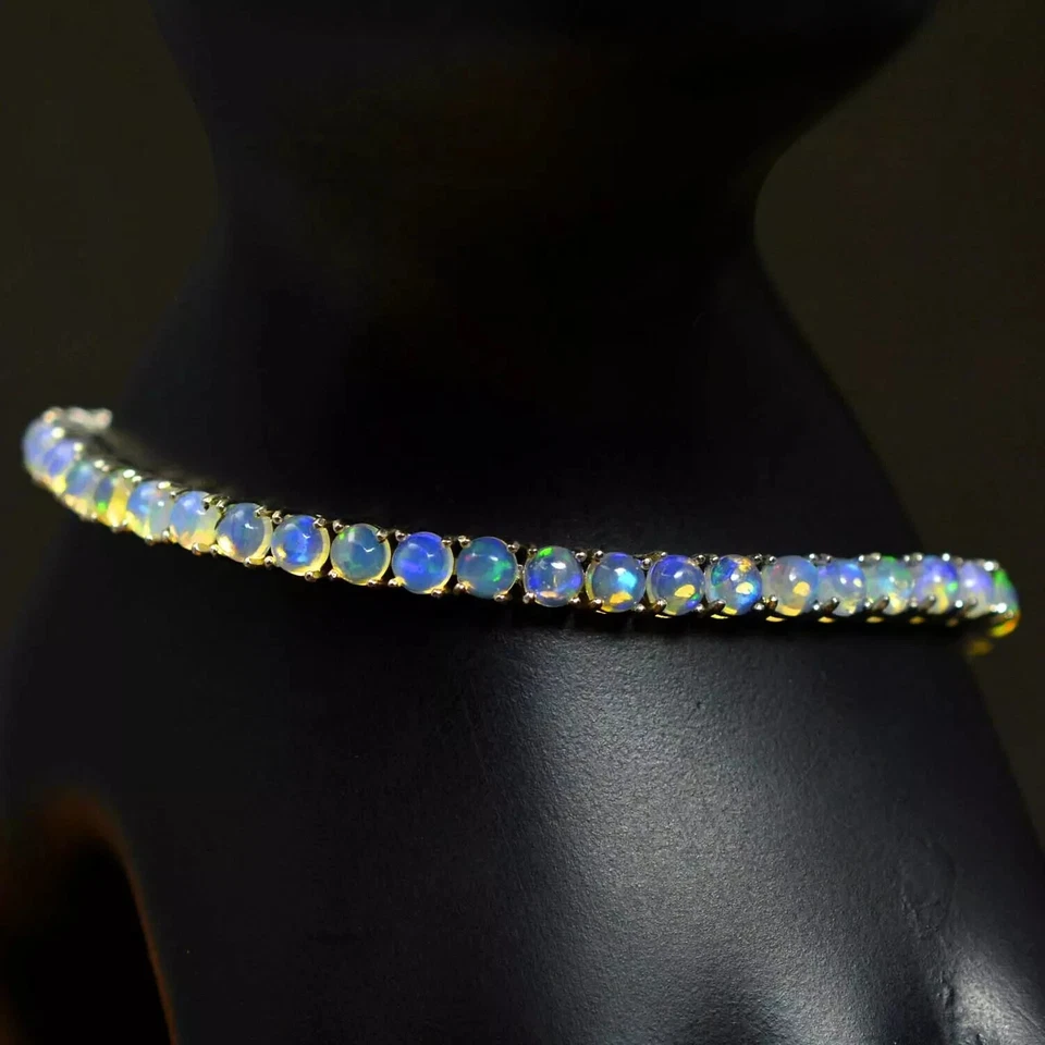 Brazalete de tenis de ópalo de fuego de corte redondo de 4 mm enchapado en oro blanco de 14K de 7" Foto 2 de 4