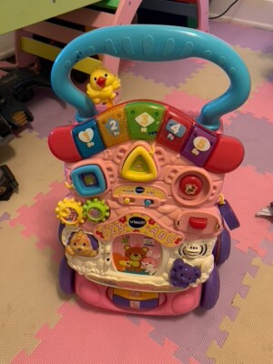 V Tech Learning Walker Board Interactive Learning Toy Sit to Stand Music Lights