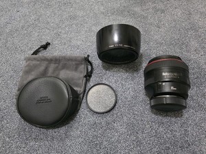 Canon  EF 85mm f/1.2L II USM  Lens + Hood+Pouch+ Hoya Filter. Very Good Cond.