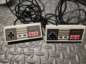 NES Console, 2 Controllers and AC Adapter (Untested, turns on)