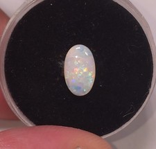 Australian Coober Pedy Solid Opal 0.65ct 9.5x6mm Oval Bright multicolour Fire