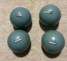 4 new unused ball candles 2x2x2 teal/blue