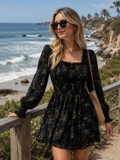 A Black Floral mini dress features a square neckline, Long Puff Sleeves/29x25/ S