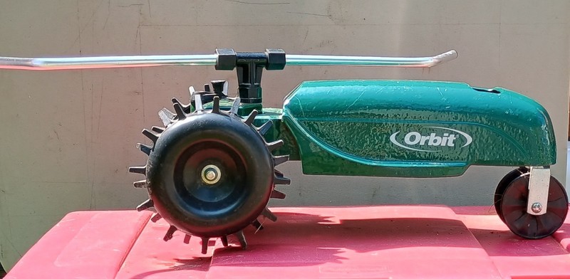 Orbit 58322 Traveling Sprinkler Green Tractor Cast Iron Garden Watering Sprayer