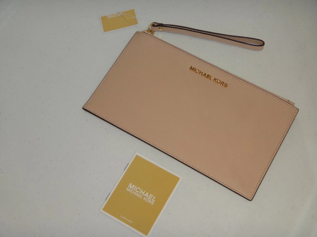 Michael kors hotsell lg zip clutch