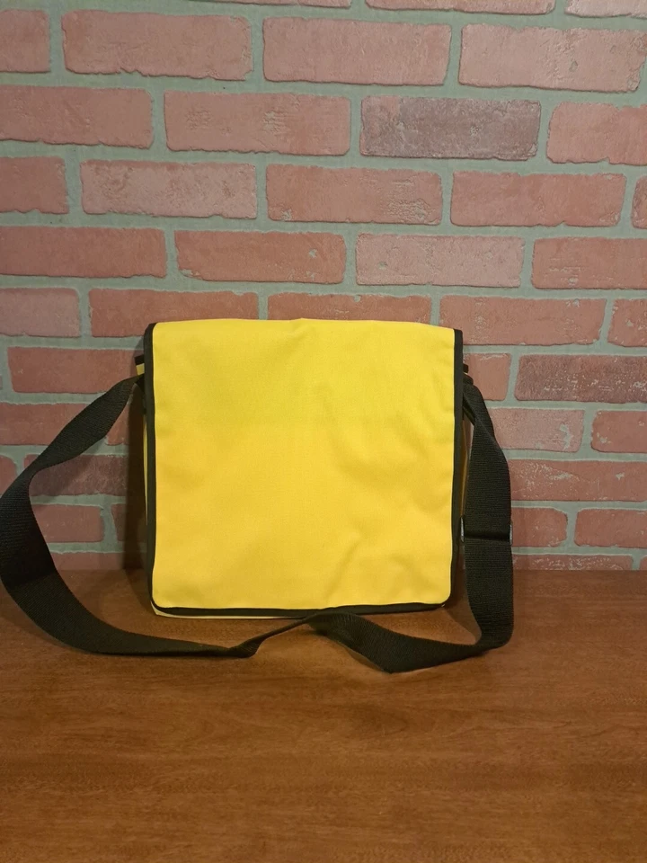 Bolsa mensajera Evil TV yunque amarilla y negra Foto 2 de 4