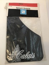 RARE OEM NOS GM Calais Black Rear Splash Guar...