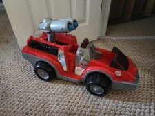 Fisher-Price Rescue Heroes Voice Tech Plastic Toy Firefighter Fire Truck