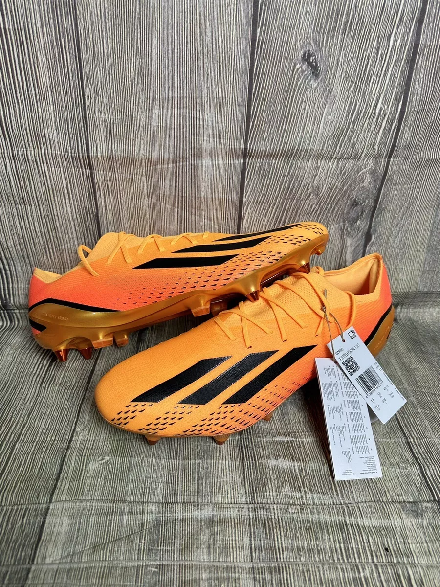 Orange football hotsell boots