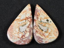 Paire de pierres précieuses assorties en peau de léopard naturelle de 27 ct. ...