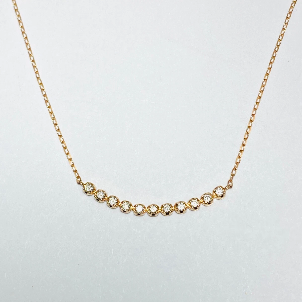 Rose gold curved bar on sale necklace