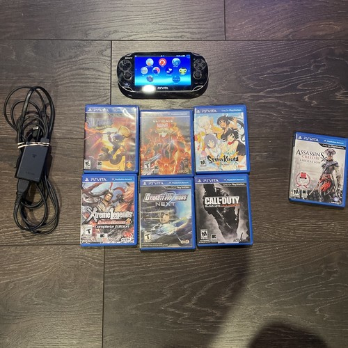 Sony PlayStation PS Vita PCH1001 Black W/ OEM 4GB Memory Card, Charger