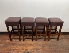 Set of 4 square bar / pub stools with brown faux-leather tops