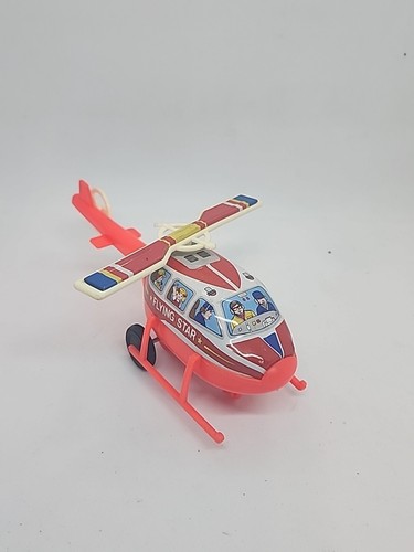 JIMMY TOYS 80's 7'' RED FLYING STAR HELICOPTER TIN & PLASTIC SPINNING BLADES TOY - Picture 2 of 4