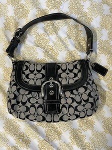 black signature coach purse