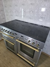 CERAMIC RANGEMASTER 110CM RANGE COOKER IN STAINLESS STEEL AND GOLD. Ref--ED388