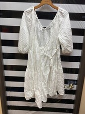 Women "Love Whit" white long sleeves wrap around dress. Size Med. Prev. Owned